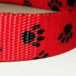 Dog Collar, Red With Black Pawprints Size Medium..